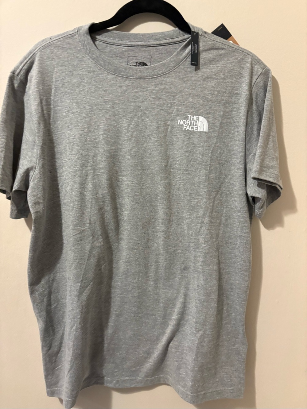The North Face NWT Heather Grey Short Sleeve Logo Tee with decal on back
